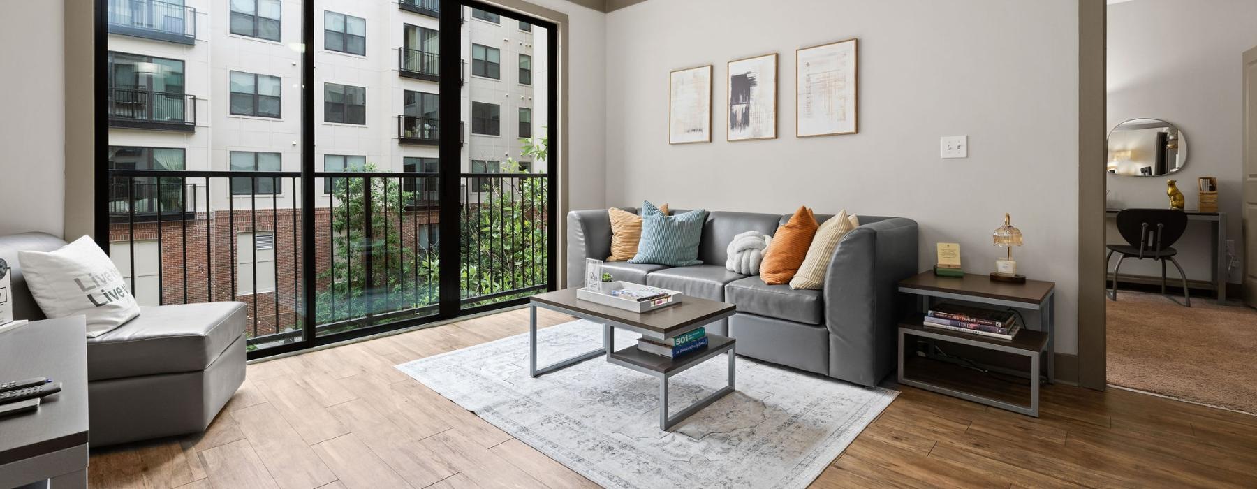 a living room with a large glass door